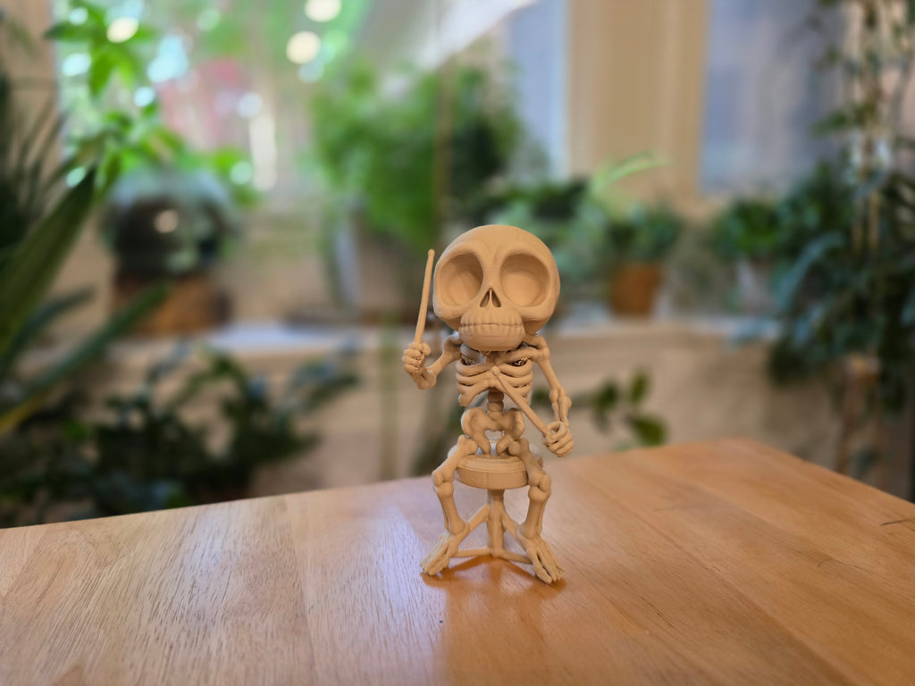 Skelett Figur entspannt Trommler