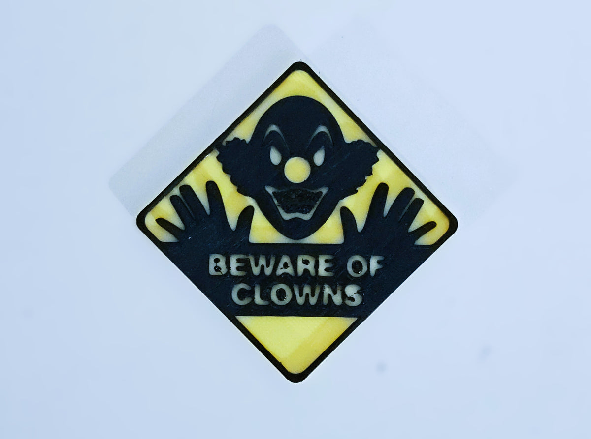 Schild Beware of Clowns