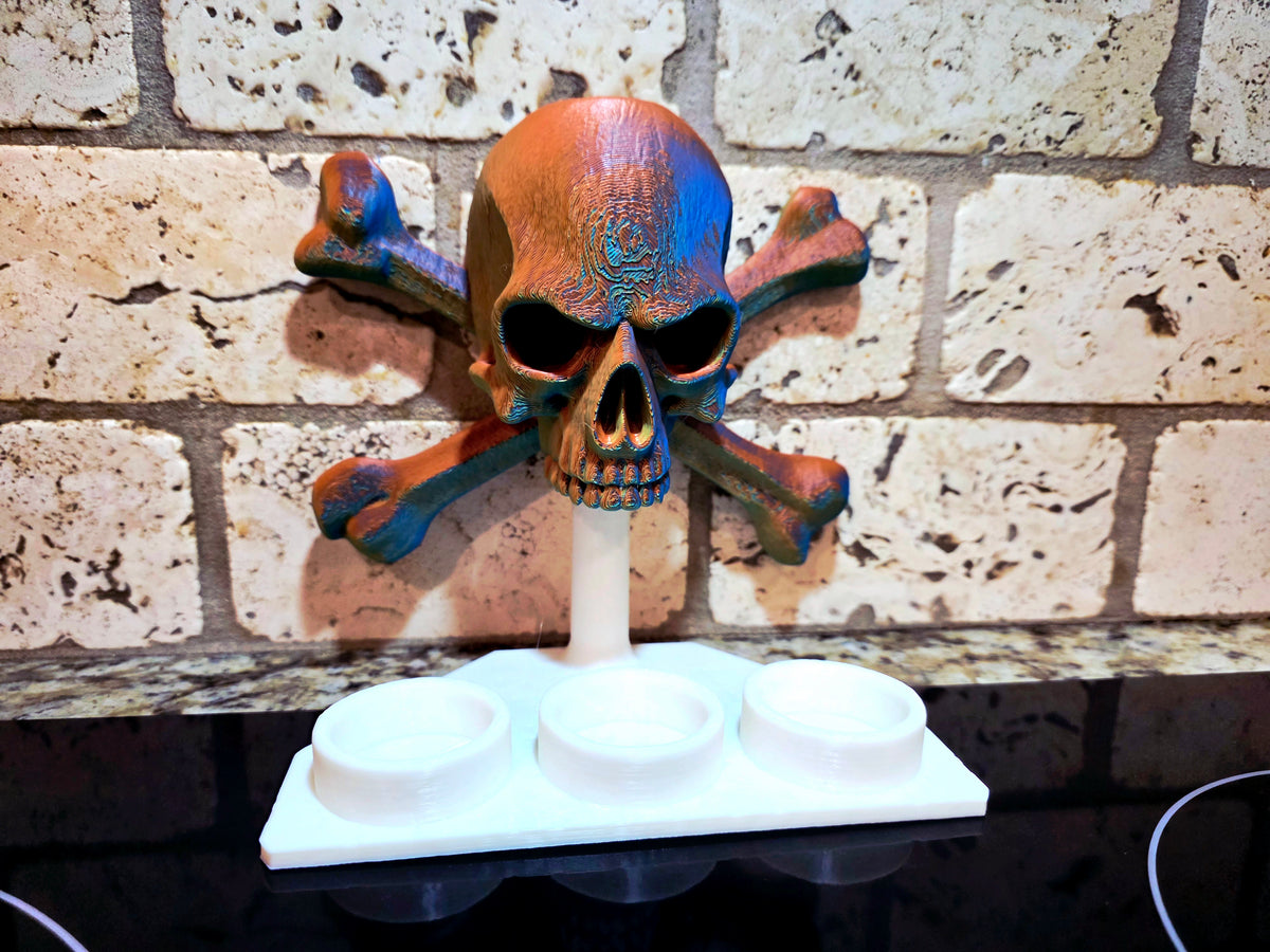 Schnapsglas-Halter Totenkopf mit Knochen