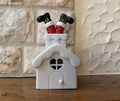 Lichthaus Weihnachtsmann steckt im Kamin