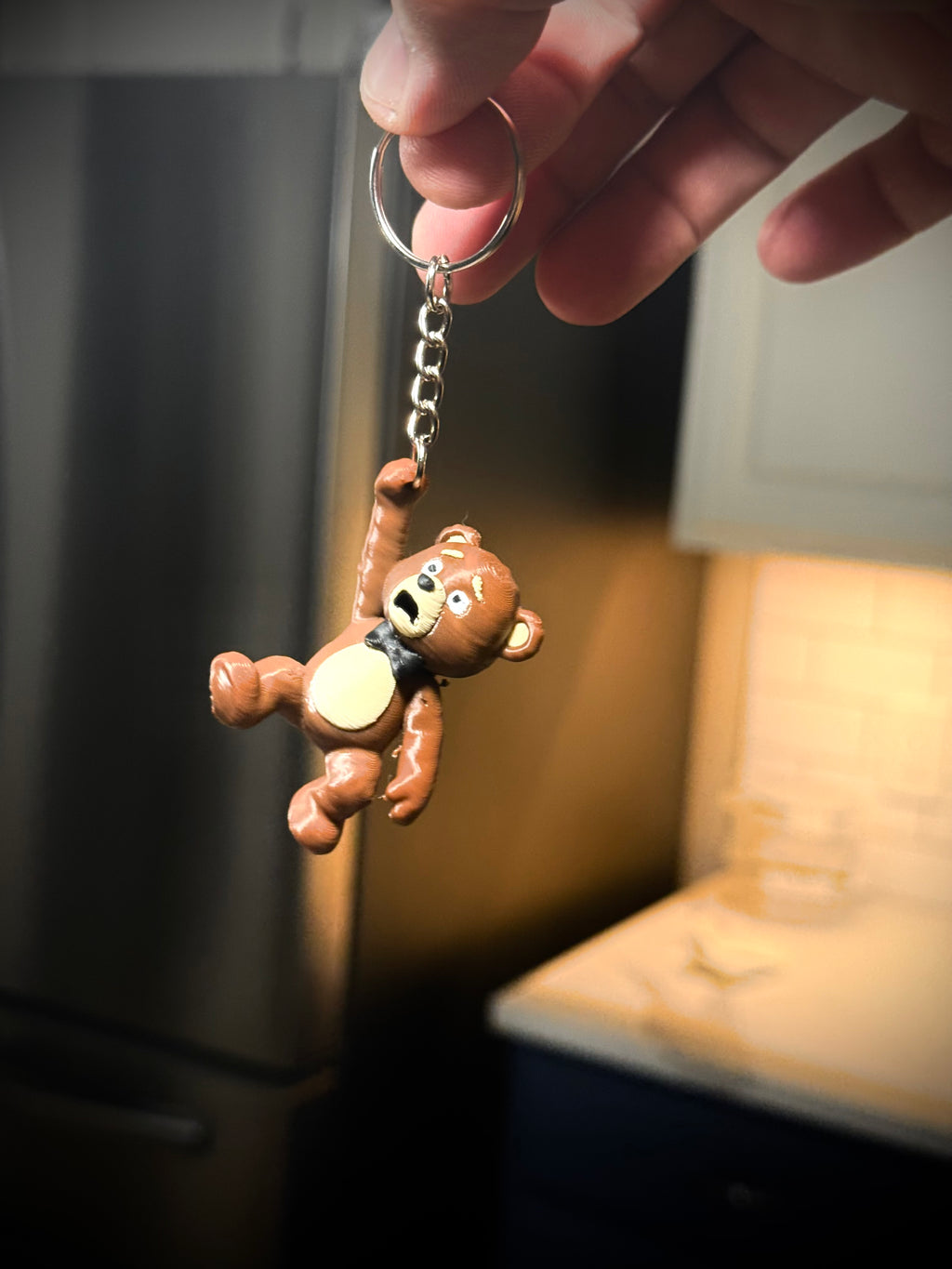 Schlüsselanhänger Teddybär hängend bunt