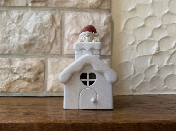 Lichthaus Weihnachtswichtel schaut heraus