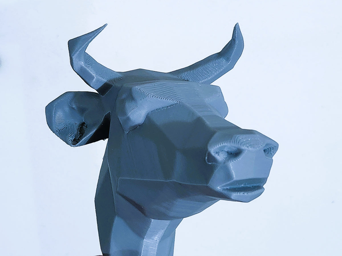 Kuhkopf Low Poly Wanddeko