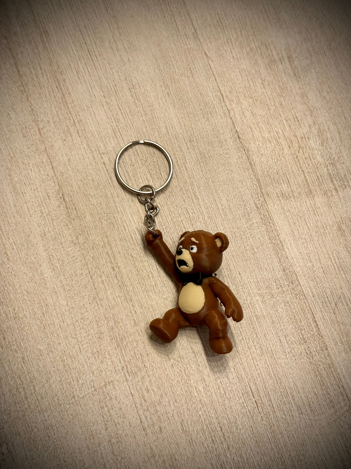 Schlüsselanhänger Teddybär hängend bunt