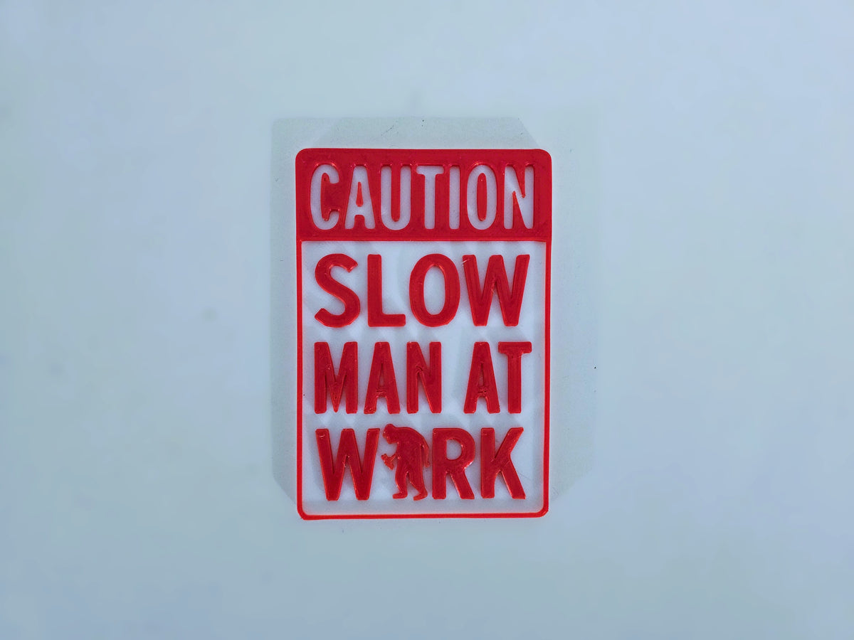 Schild Achtung langsamer Mann