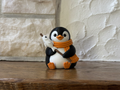 Figur Pinguin am Lagerfeuer Deko