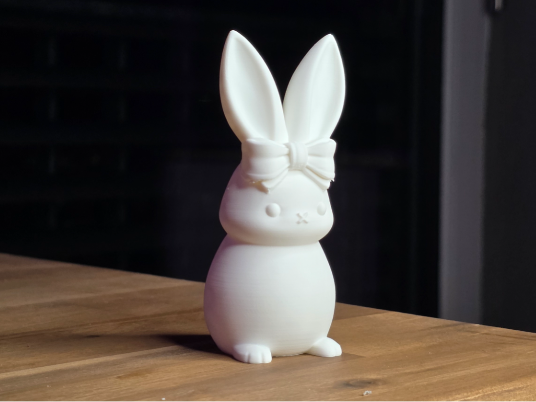 Niedliches Kaninchen mit Schleife Osterdeko Figur Deko Statue Ostern Tiere