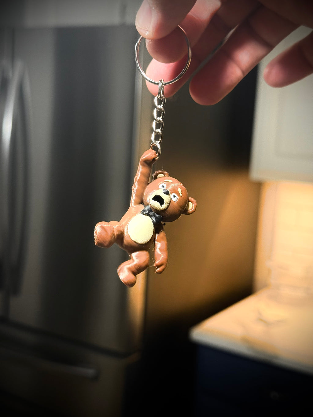 Schlüsselanhänger Teddybär hängend bunt