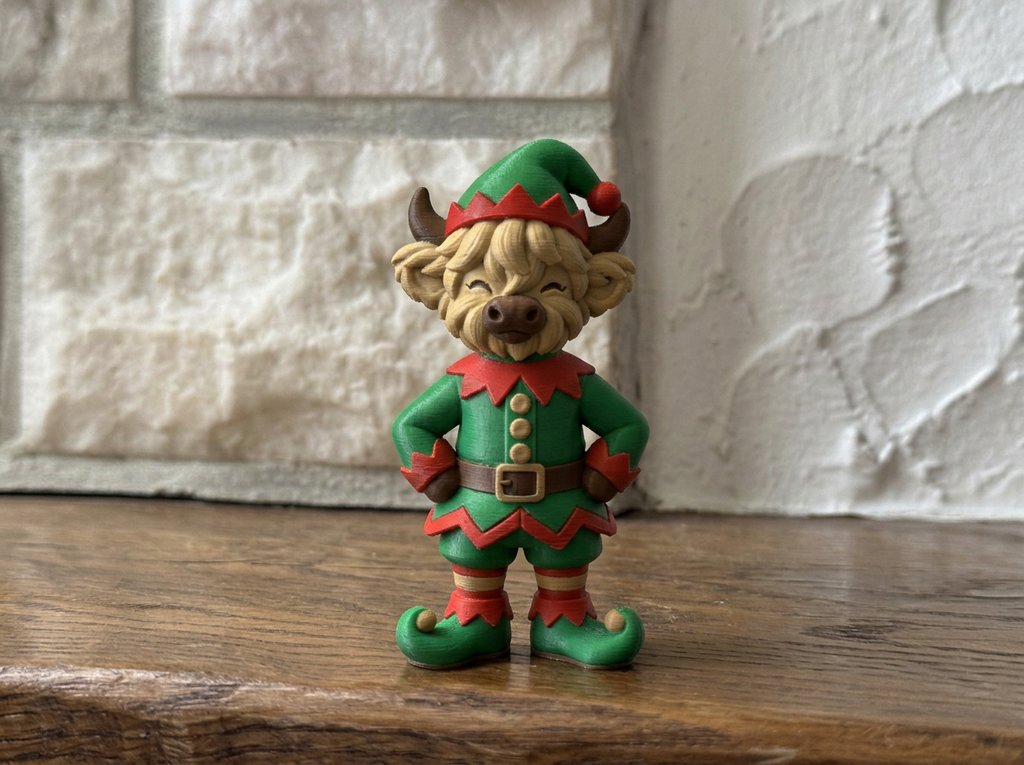 Weihnachtsfigur Hochlandrind als Weihnachtself